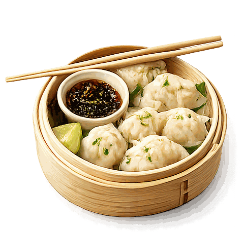 Ångade dumplings i bambukorg med dipsås